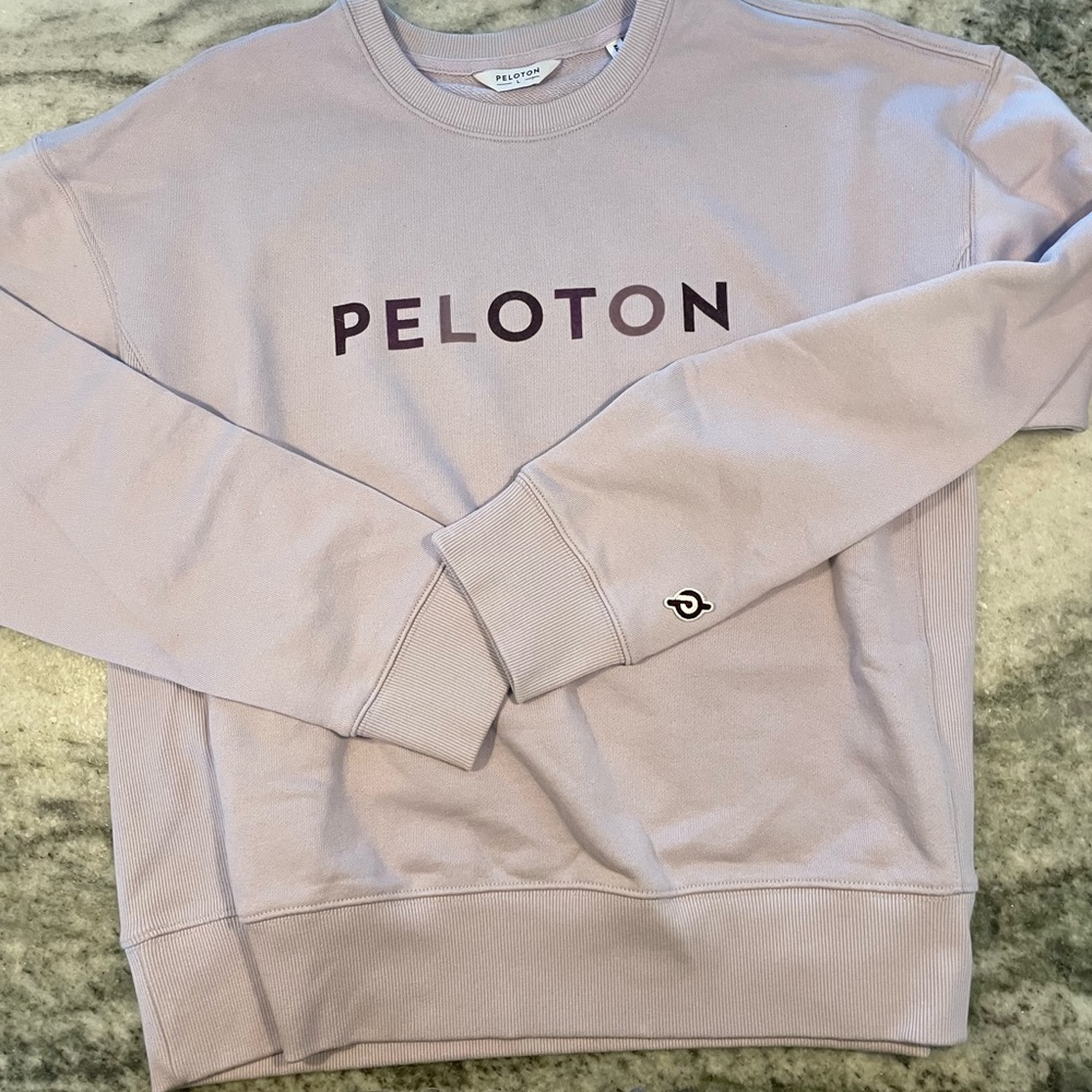 Peloton Women’s lilac sweatshirt - NEVER worn size L